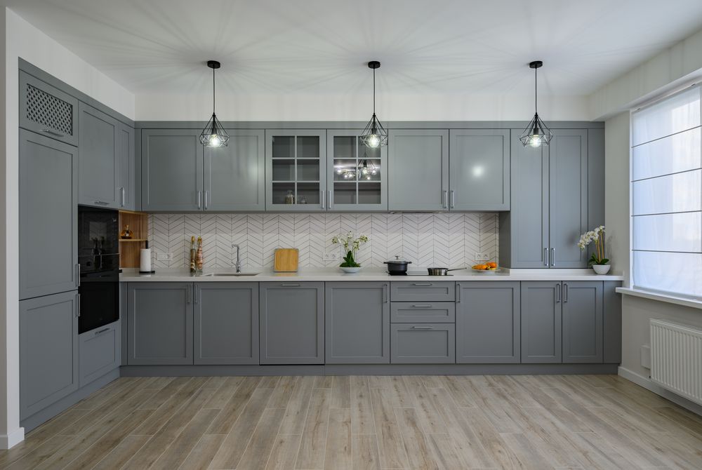 trendy-grey-white-modern-kitchen-furniture-front-view.jpg